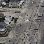 A building sits in the middle of the road in Belmar, N.J.